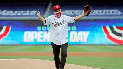 True Champion Fauci Throws First Pitch on Opening Day NIH Record